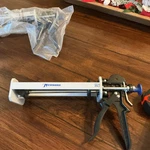 Newborn 435-XSAN 26:1 Caulk Gun. Fixed Price $40.00.