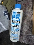 Irontite All Weather Seal, Blue, 16 Oz. Fixed Price $31.00.