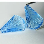 19.17CTS Extraordinary Natural Swizz Blue Topaz Carving Matching Pair. Fixed Price $129.99.