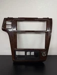 2001-2004 Nissan Pathfinder QX4 Wood Grain Center Dash Radio Bezel Trim Panel. Fixed Price $109.99.