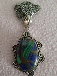 Multicolored Oval Stone Pendant Set Silver With 18 Inch Chain. Fixed Price $9.99.
