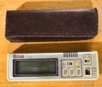 Vtg Comus TC-10 Miniature Portable Liquid Crystal Alarm Clock Battery Operated. Fixed Price $21.00.