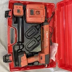 Hilti Cordless Epoxy Gun Set With Batteries, Charger, & Case. Fixed Price $99.95.