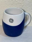 White Ge Logo Coffee Cup / Mug With Blue Silicone Grip, 14 Oz. Fixed Price $6.15.