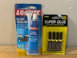 Loctite Clear Silicone Sealant 2.7 Oz.tube & (4) Pack Super Clue Lot. Fixed Price $21.99.